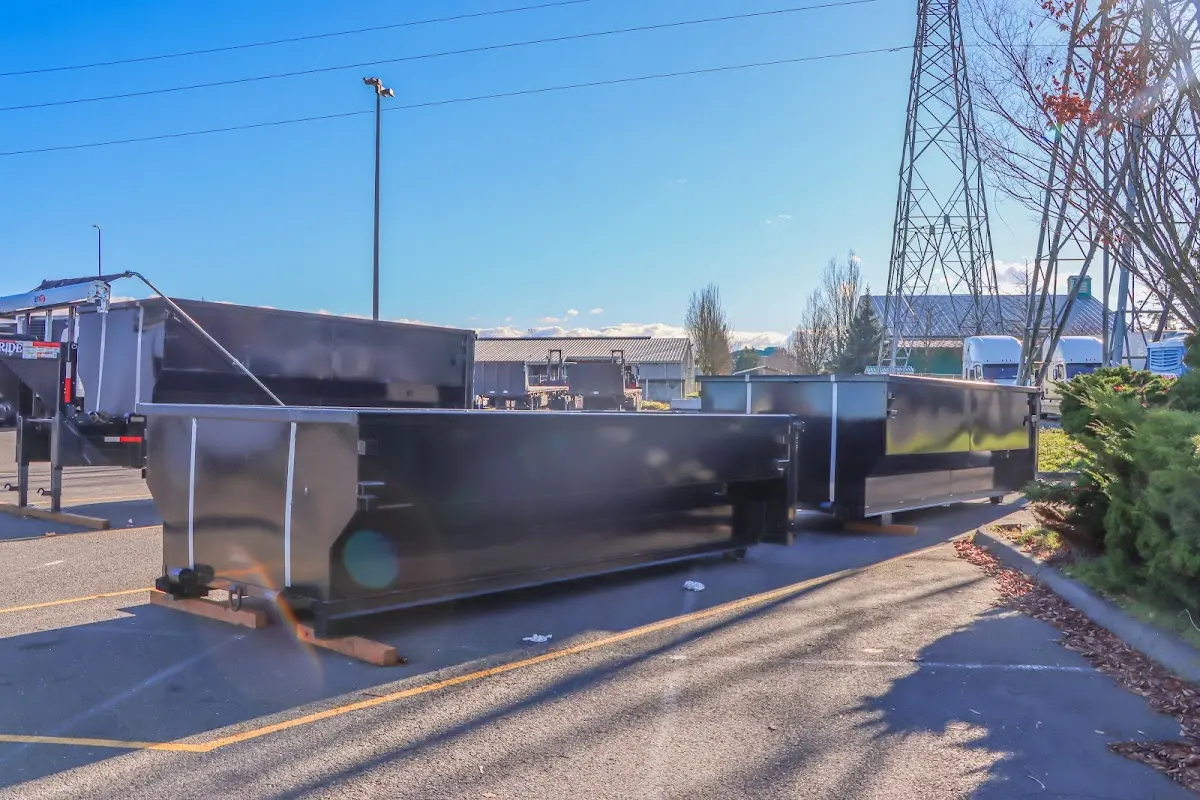 Roll-off dumpster ready for waste disposal at job site for 15 Yard Dumpster Rental in Hampton